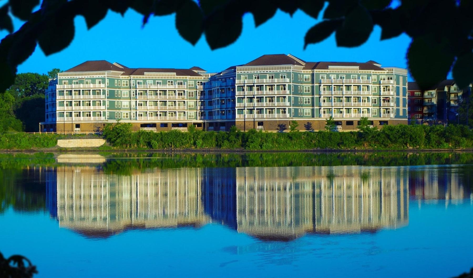 a building with a body of water in front of it